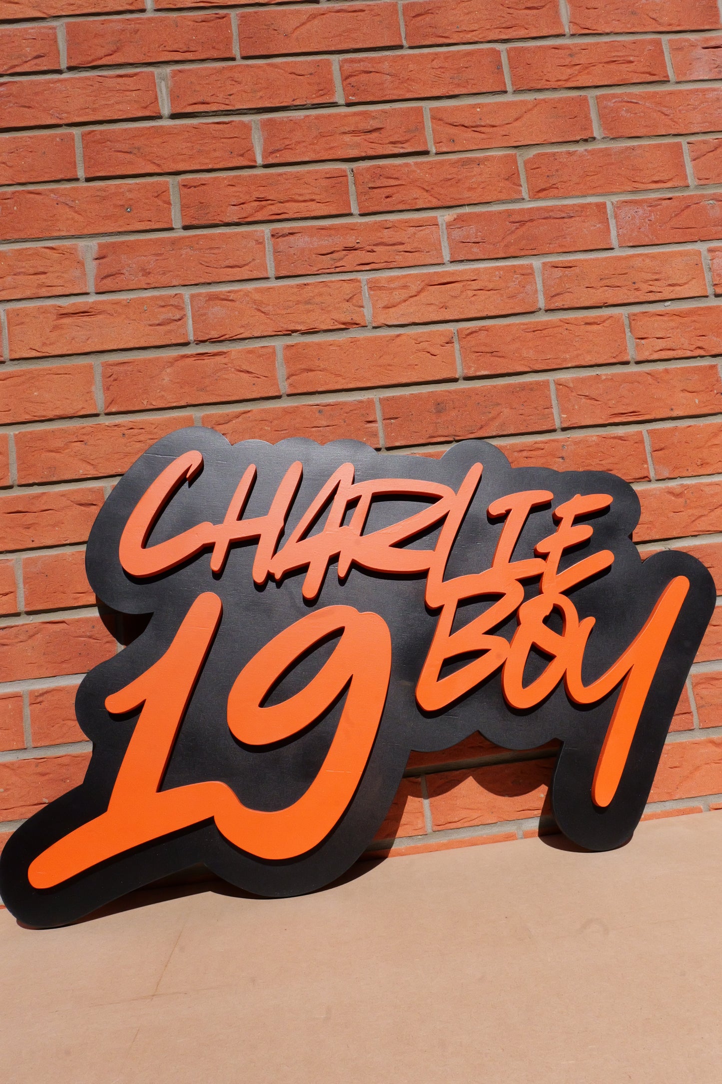 Orange and Black Motocross Sign