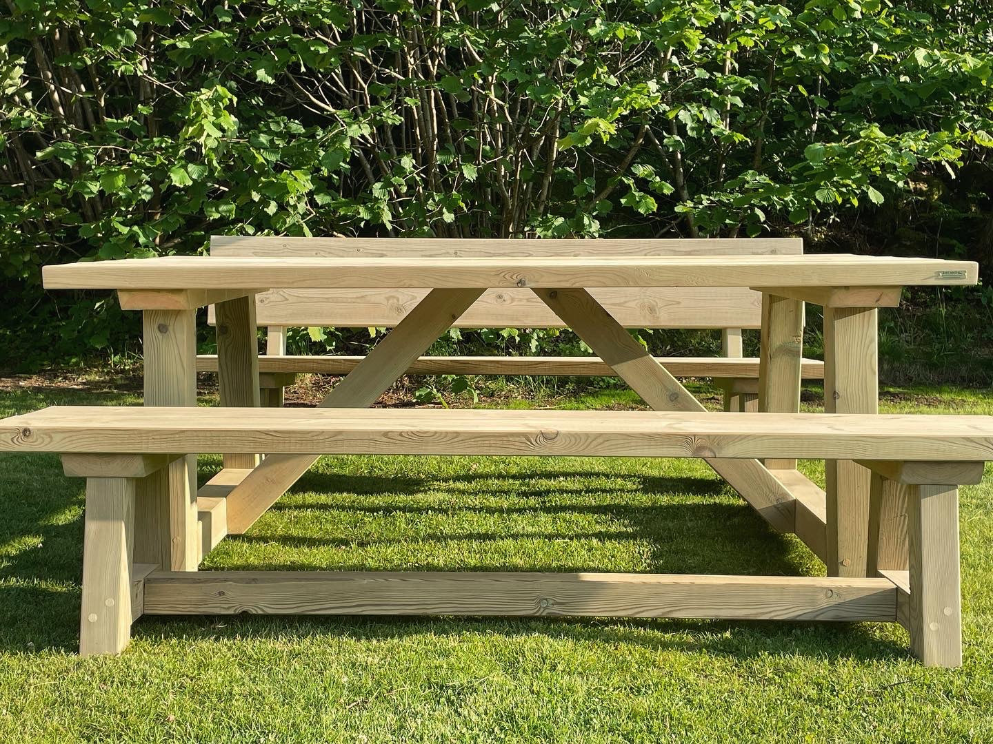 Close-up of handcrafted wooden frame on Scandi-style garden set